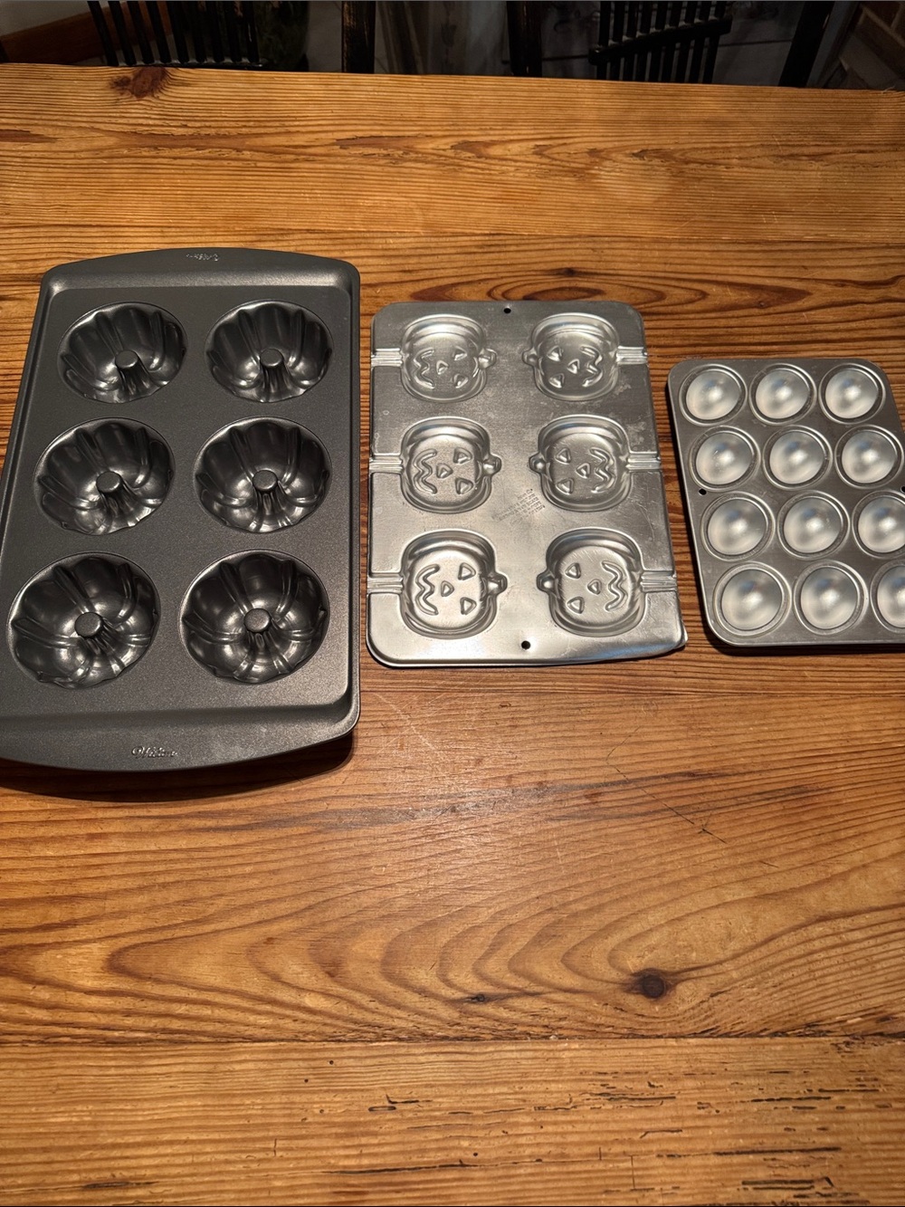 3 Wilton baking pans: mini Bundt cakes; pumpkins; and eggs